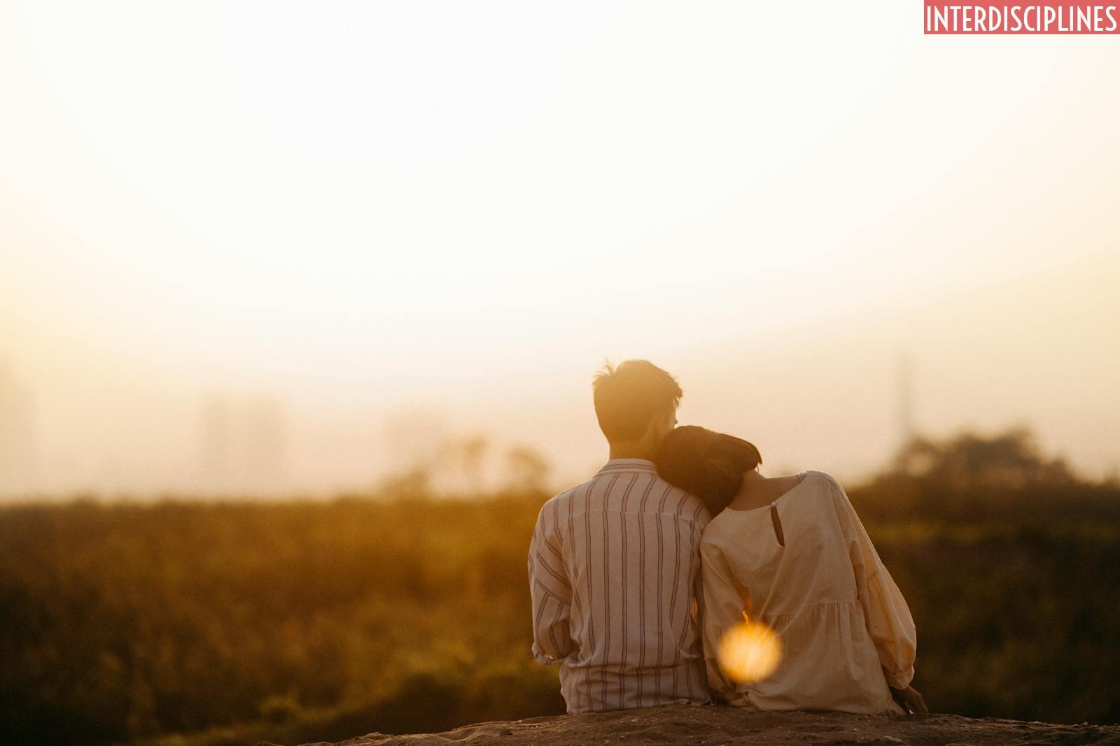 Man and Woman Near Grass Field
