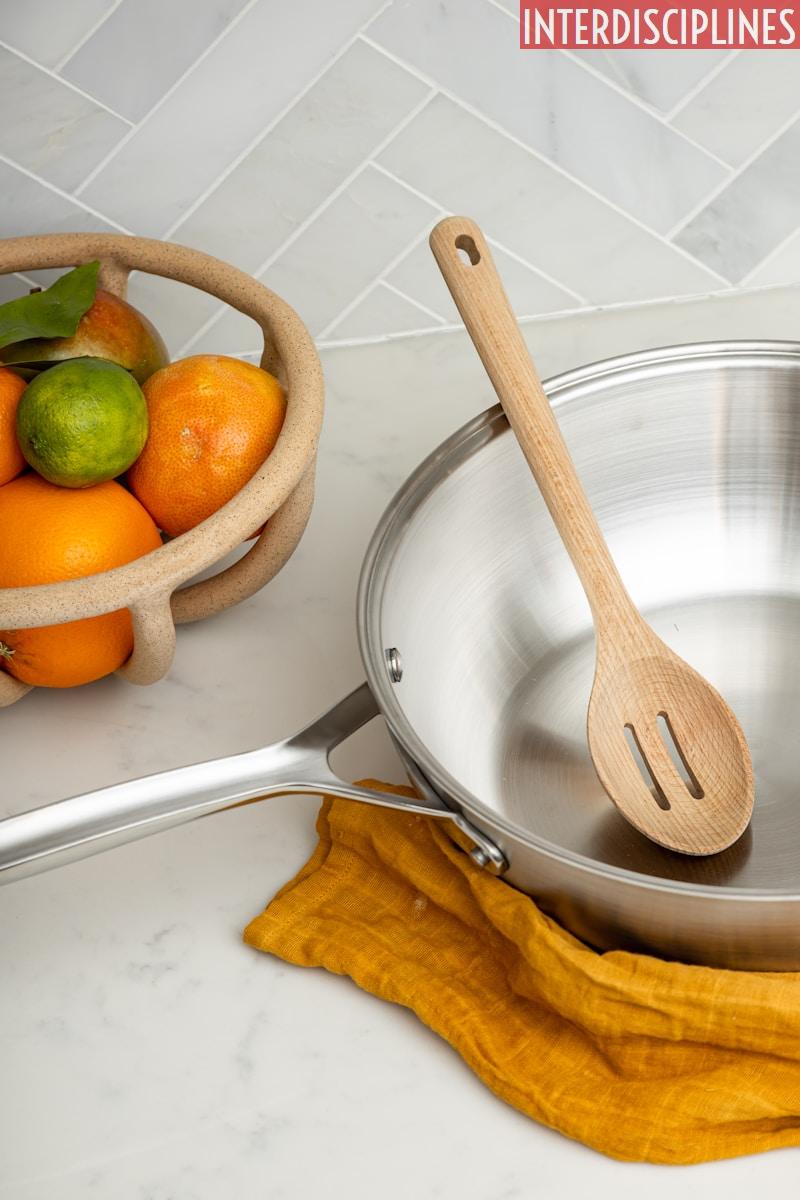 orange fruit on stainless steel bowl